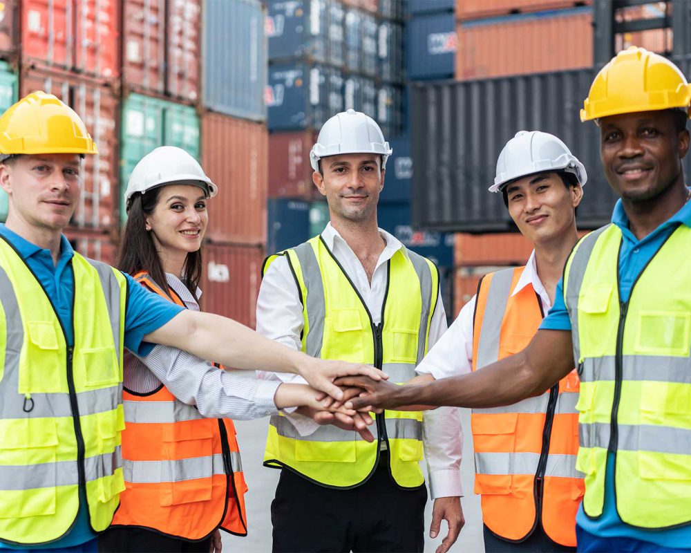 group-of-man-and-woman-worker-put-hand-on-each-oth-2023-11-27-05-37-00-utc